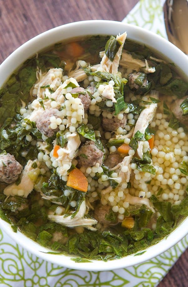 A classic Italian wedding soup recipe, with little bits of pasta, shredded chicken, spinach and of course those little meatballs!