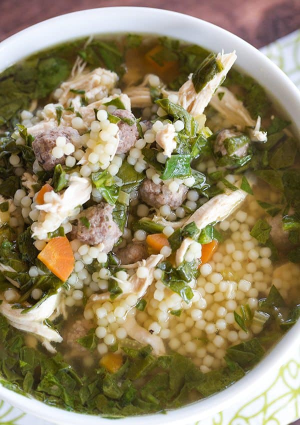 A classic Italian wedding soup recipe, with little bits of pasta, shredded chicken, spinach and of course those little meatballs!