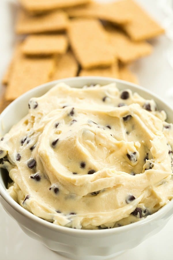 Chocolate Chip Cookie Dough Dip - A sweet, creamy dip that tastes like chocolate chip cookie dough without the guilt of raw egg! | browneyedbaker.com #recipe