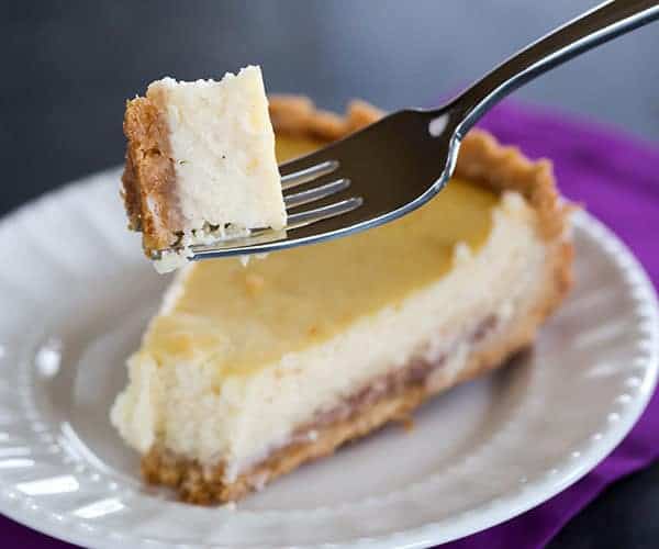 Hidden Berry Cream Cheese Torte - A luscious cream cheese filling sits atop a shortbread crust and a layer of strawberry jam. | browneyedbaker.com