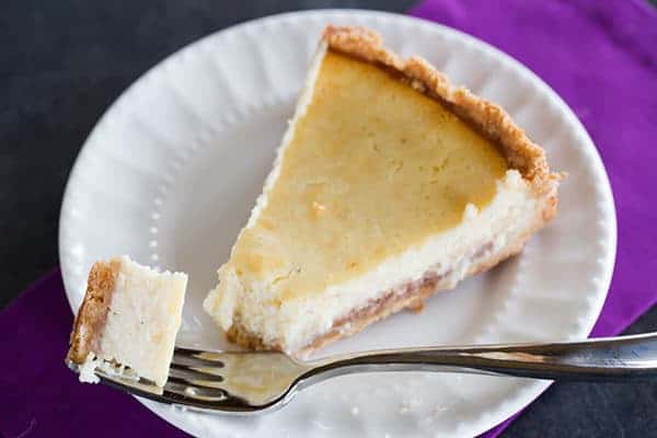 Hidden Berry Cream Cheese Torte - A luscious cream cheese filling sits atop a shortbread crust and a layer of strawberry jam. | browneyedbaker.com