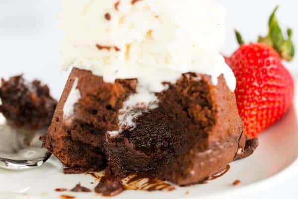 Gooey Chocolate Cakes - Baked in individual servings and packed with loads of chocolate flavor, this recipe from Dorie Greenspan is perfect for dinner parties or keeping some dessert stashed in the freezer!