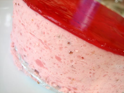 Side view of strawberry mirror cake.