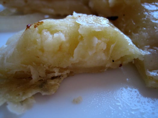 Pierogi on a white plate.