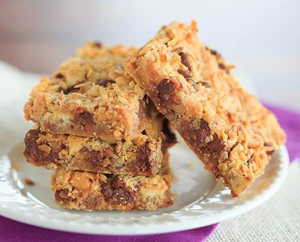 Seven Layer Bars, aka Magic Bars - Seven glorious layers of graham crackers, nuts, chocolate chips, white chocolate chips, butterscotch chips, coconut and sweetened condensed milk! | https://apex-male.info/seven-layer-bars/