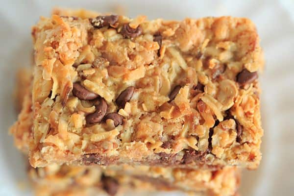 Seven Layer Bars, aka Magic Bars - Seven glorious layers of graham crackers, nuts, chocolate chips, white chocolate chips, butterscotch chips, coconut and sweetened condensed milk! | https://apex-male.info/seven-layer-bars/
