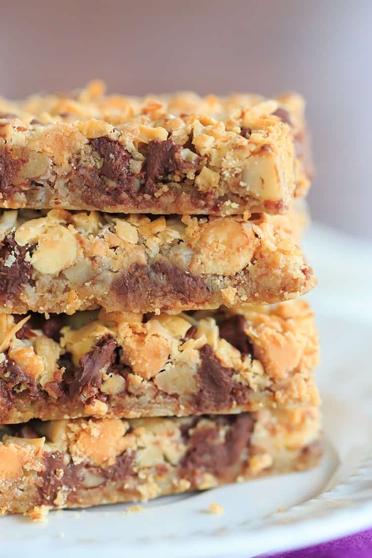 Seven Layer Bars, aka Magic Bars - Seven glorious layers of graham crackers, nuts, chocolate chips, white chocolate chips, butterscotch chips, coconut and sweetened condensed milk! | https://apex-male.info/seven-layer-bars/