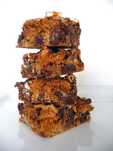 Stack of chocolate chip and pretzel cookie bars.