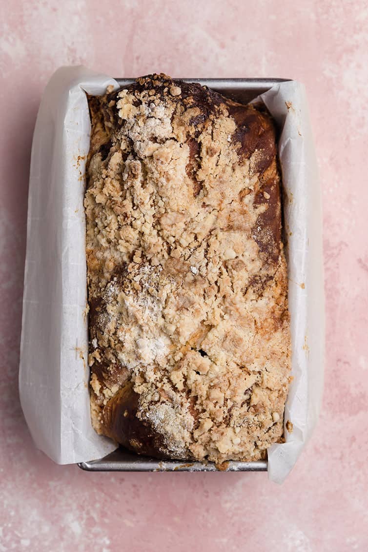An overhead photo of a loaf of chocolate babka out of the oven.