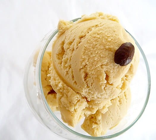 Scoops of espresso ice cream in a glass bowl.