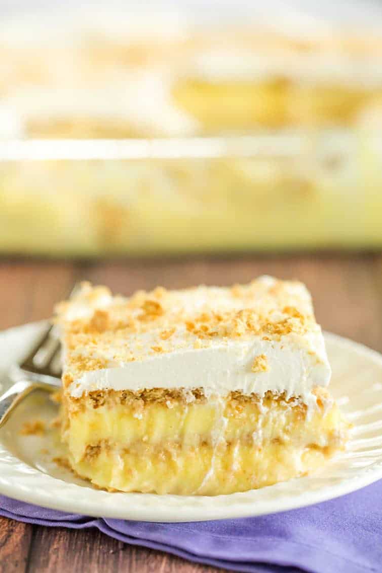 A big slice of icebox cake with layers of pudding and graham crackers.