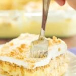 A piece of icebox cake with a fork digging right in!