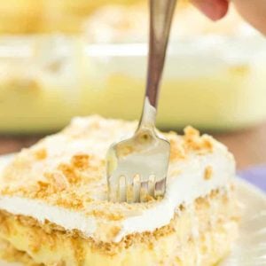 A piece of icebox cake with a fork digging right in!