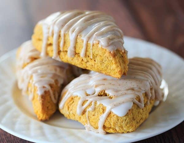 Pumpkin Scones with Spiced Glaze - A Starbucks copycat! | https://apex-male.info/pumpkin-scones-spiced-glaze/
