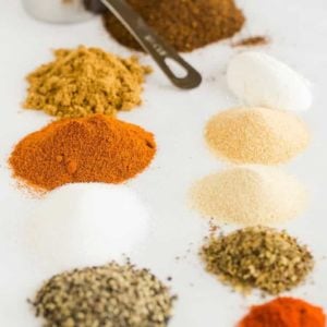 All of the spices lined up and ready to be mixed together for Homemade Taco Seasoning.