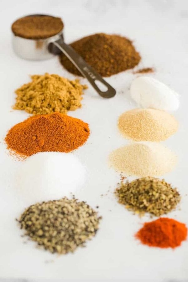 All of the spices lined up and ready to be mixed together for Homemade Taco Seasoning.
