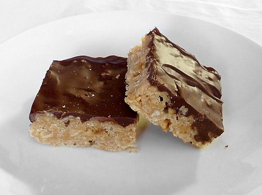 2 Scotcheroos on a white plate.