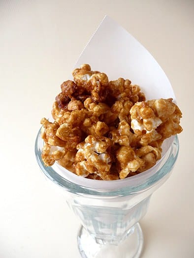Homemade Cracker Jack popcorn in a glass.
