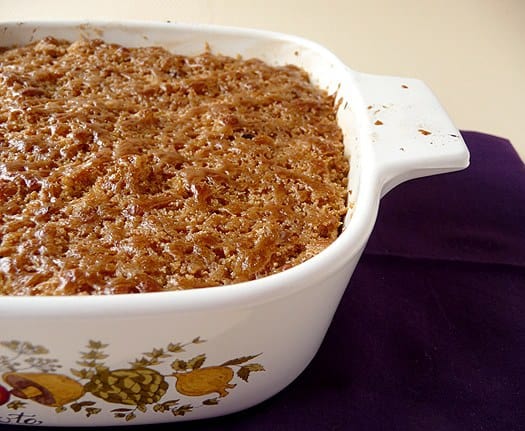 Mashed sweet potato brûlée in a casserole dish.
