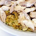 Turkey casserole in a white serving dish.