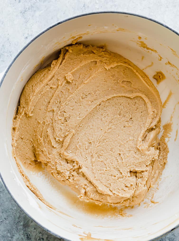 Peanut butter fudge freshly mixed together in a pot.