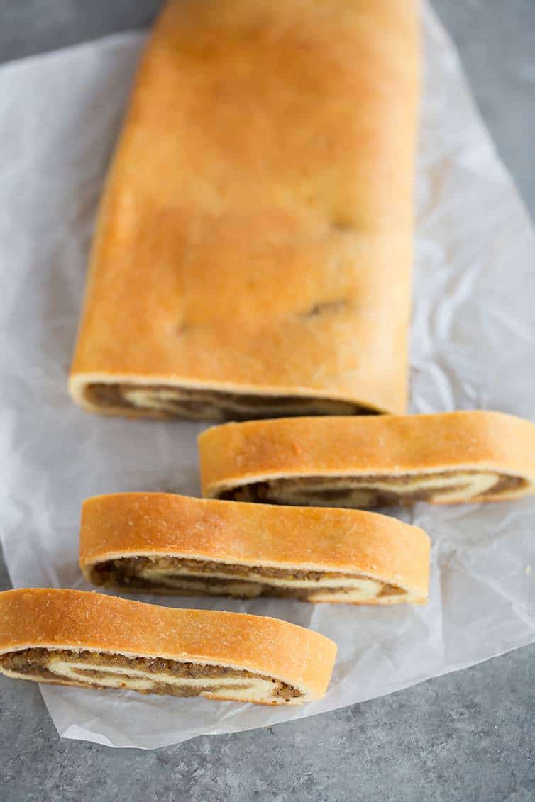 An overhead view of sliced nut roll.