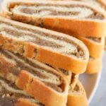 A plate with slices of nut roll.