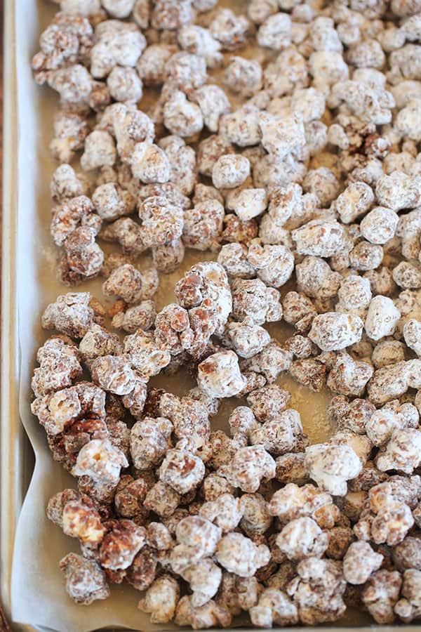 This popcorn version of the enormously popular muddy buddies (or "puppy chow") is chocolate and peanut butter-covered popcorn tossed in powdered sugar. | browneyedbaker.com