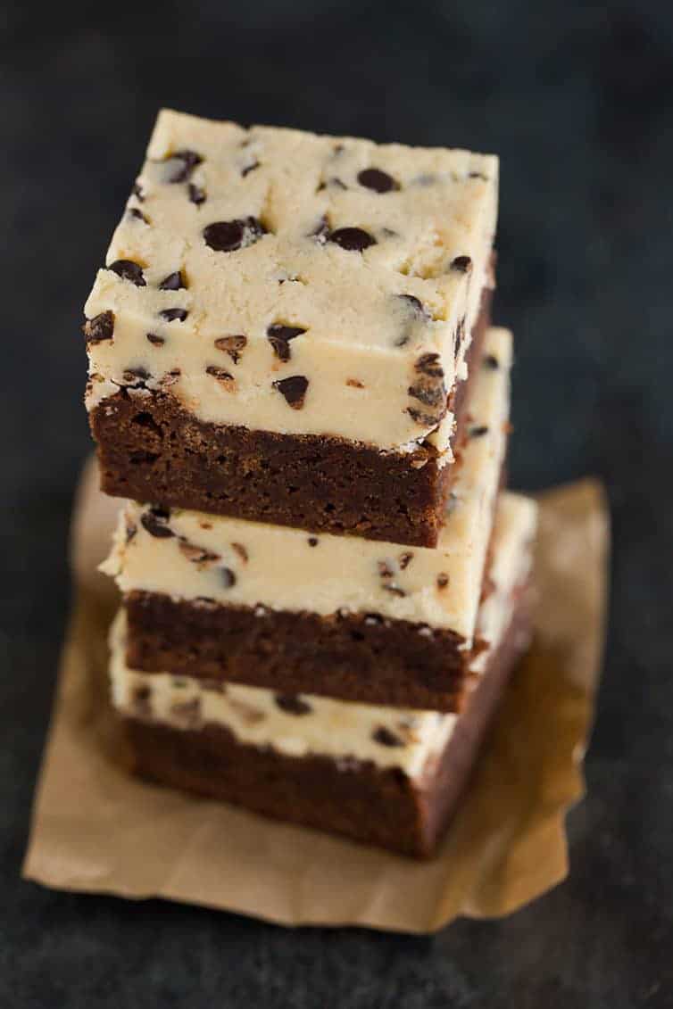 A stack of chocolate chip cookie dough brownies.