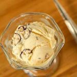 Overhead image of malted milk ice cream in a glass.