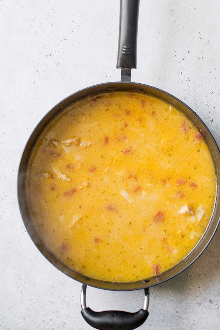 A pot with chicken tortilla soup after it's done simmering.