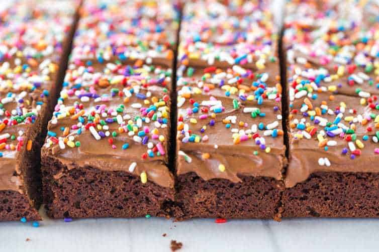 These chocolate frosted brownies start with fudge brownies and are topped with a chocolate buttercream frosting (with a secret ingredient!).