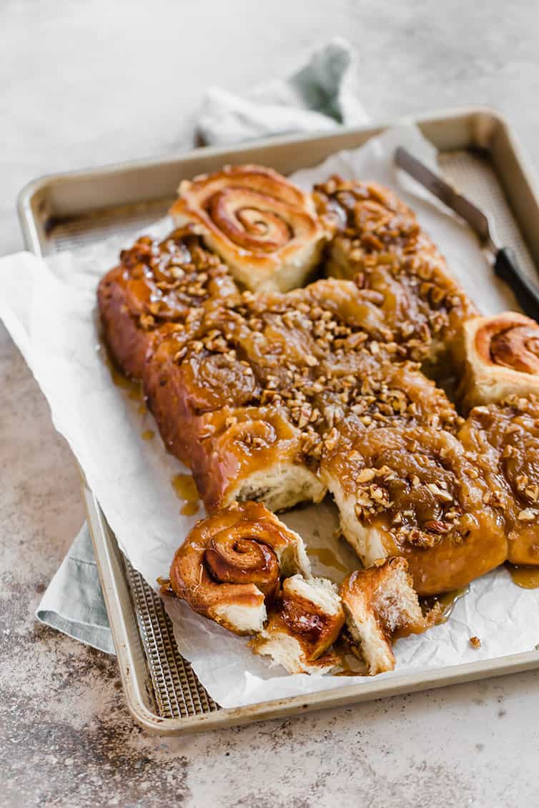 Homemade sticky buns turned out onto a pan after baking.