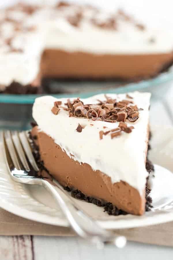Chocolate Cream Pie - A classic (from scratch!) recipe with Oreo cookie crust, a chocolate pastry cream filling and fresh whipped cream.