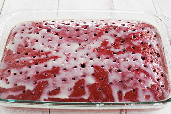 Red velvet cake is infused with sweetened condensed milk and topped with the best cream cheese frosting. A must for Valentine's Day!