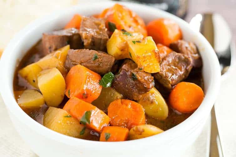 This Guinness Beef Stew recipe is rich and hearty, with a robust gravy-like sauce that is flavored by Guinness. A must for St. Patrick's Day!