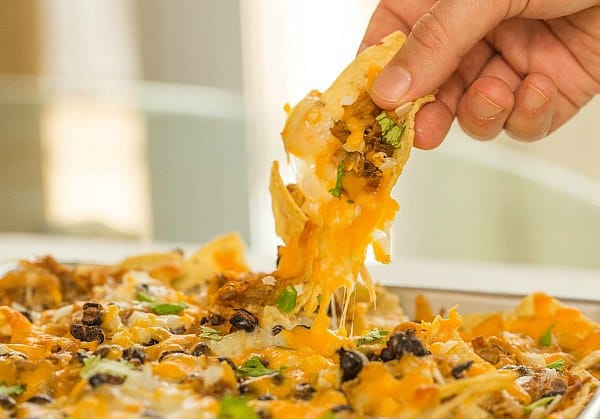 Ultimate Nachos with Beer-Braised Carnitas by @browneyedbaker :: www.browneyedbaker.com