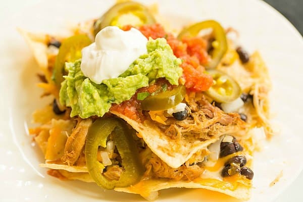 Ultimate Nachos with Beer-Braised Carnitas by @browneyedbaker :: www.browneyedbaker.com