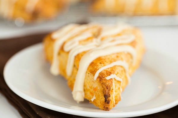 Sweet Potato Scones with Maple Cream Glaze by @browneyedbaker :: www.browneyedbaker.com