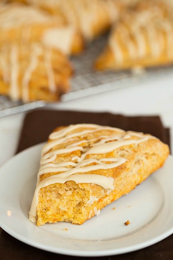Sweet Potato Scones with Maple Cream Glaze by @browneyedbaker :: www.browneyedbaker.com