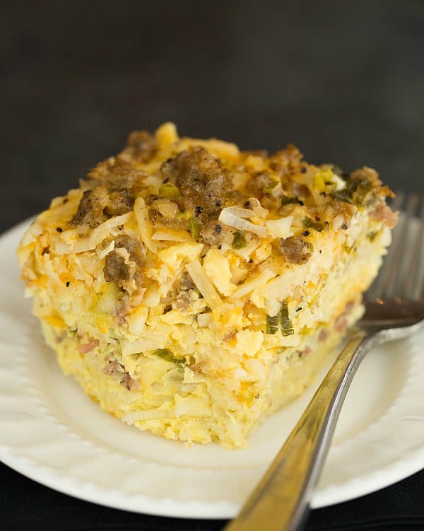 Slow Cooker Sausage, Hash Brown & Cheddar Breakfast Casserole by @browneyedbaker :: www.browneyedbaker.com