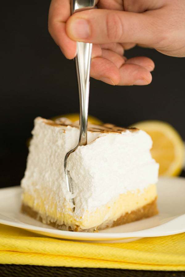 Sky-High Lemon Meringue Bars by @browneyedbaker :: www.browneyedbaker.com