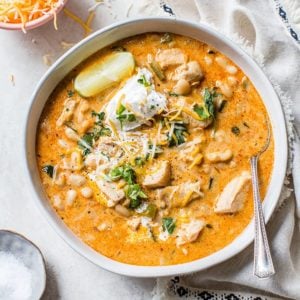 An overhead shot of a bowl of white chicken chili.