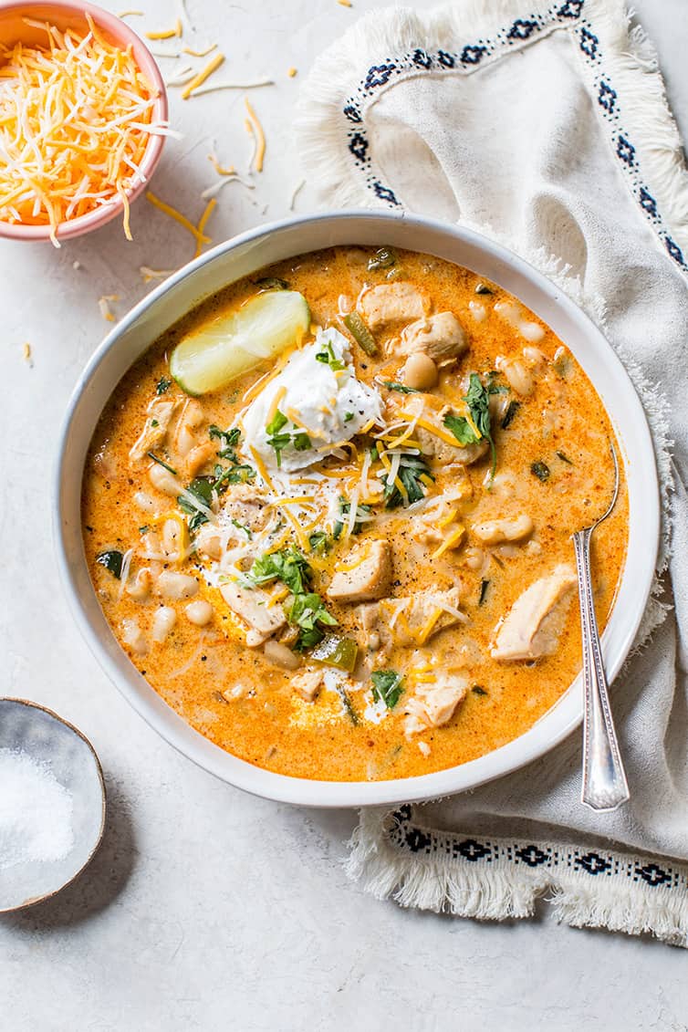 An overhead shot of a bowl of white chicken chili.