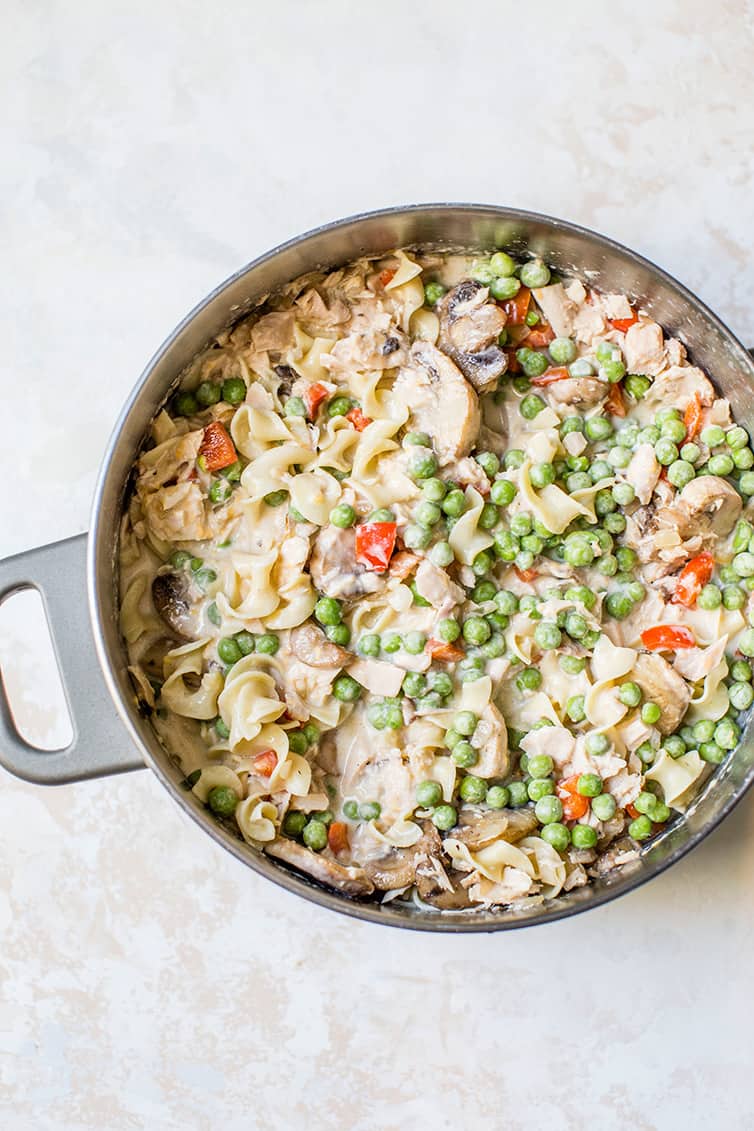 Tuna noodle casserole prepared before placing in baking dish.