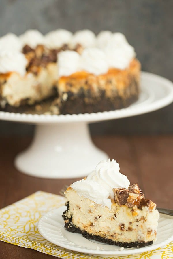 Snickers Cheesecake | browneyedbaker.com #recipe