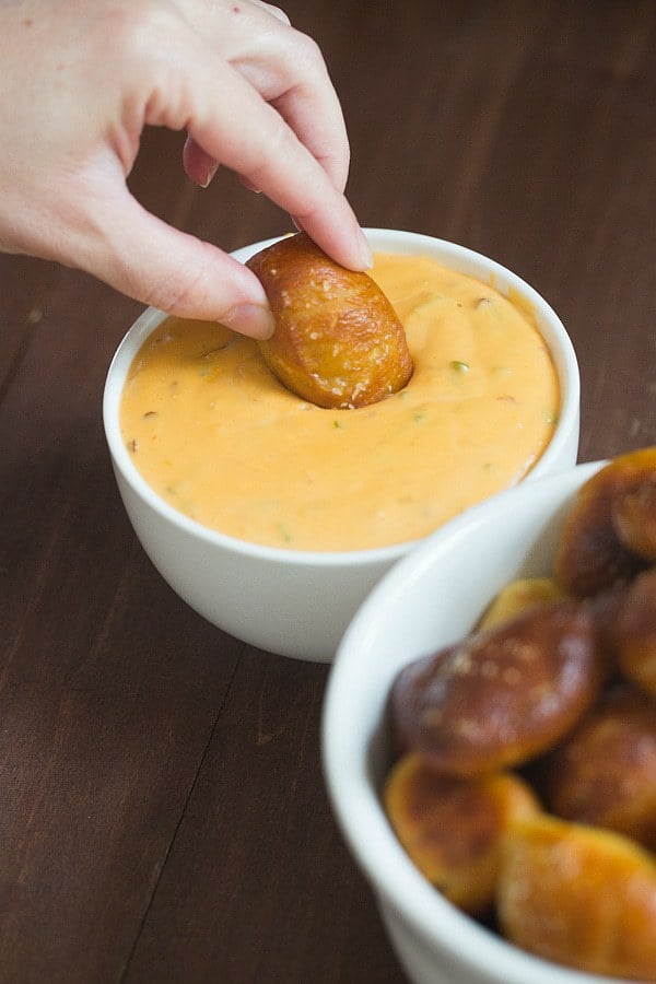 Soft Pretzel Nuggets with Spicy Cheese Dipping Sauce | browneyedbaker.com #recipe
