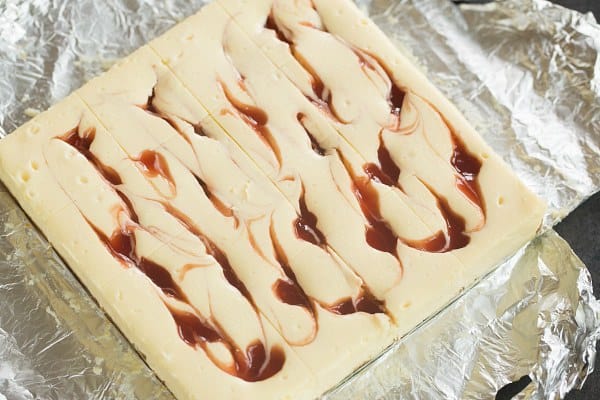 Strawberry Swirl Cheesecake Bars | browneyedbaker.com #recipe