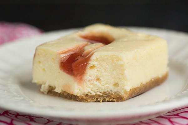 Strawberry Swirl Cheesecake Bars | browneyedbaker.com #recipe