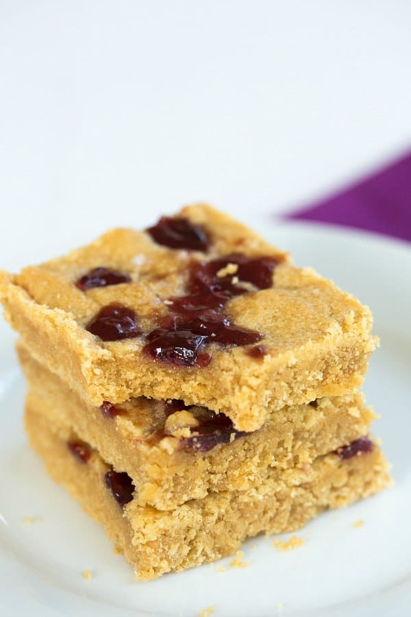 Peanut Butter & Jelly Cookie Bars | browneyedbaker.com #recipe